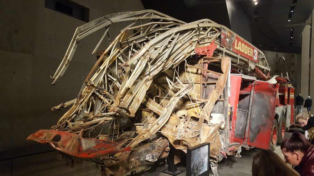 A damaged fire engine from an exhibit at the 9/11 Museum