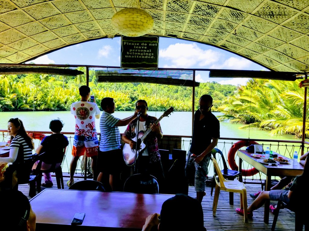 Musicians playing on the Loboc River Cruise