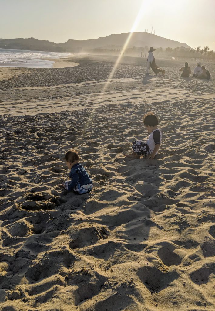 Kids playing on the beach near Hyatt Ziva Los Cabos- best Cabo resorts for families