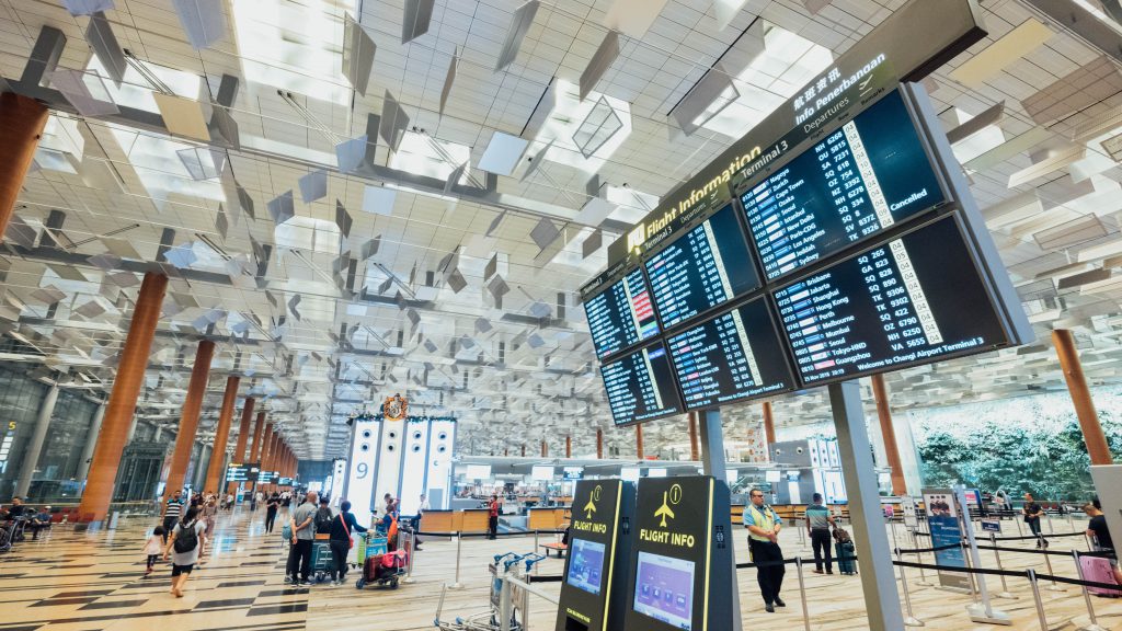 Flight status monitors in an airport terminal