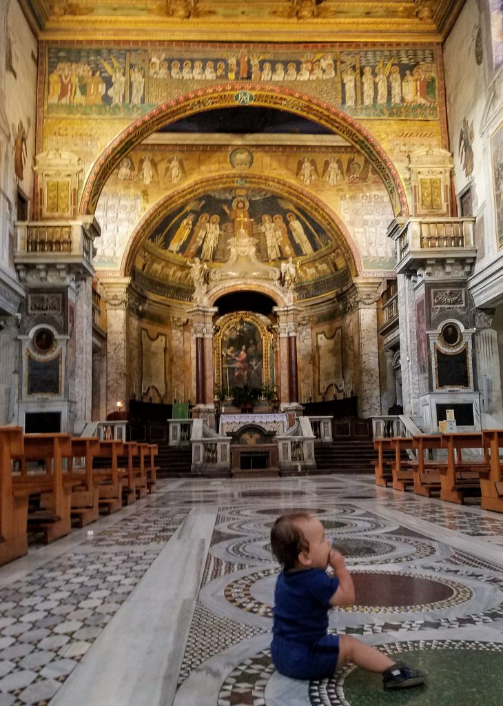 A baby in a church in Rome