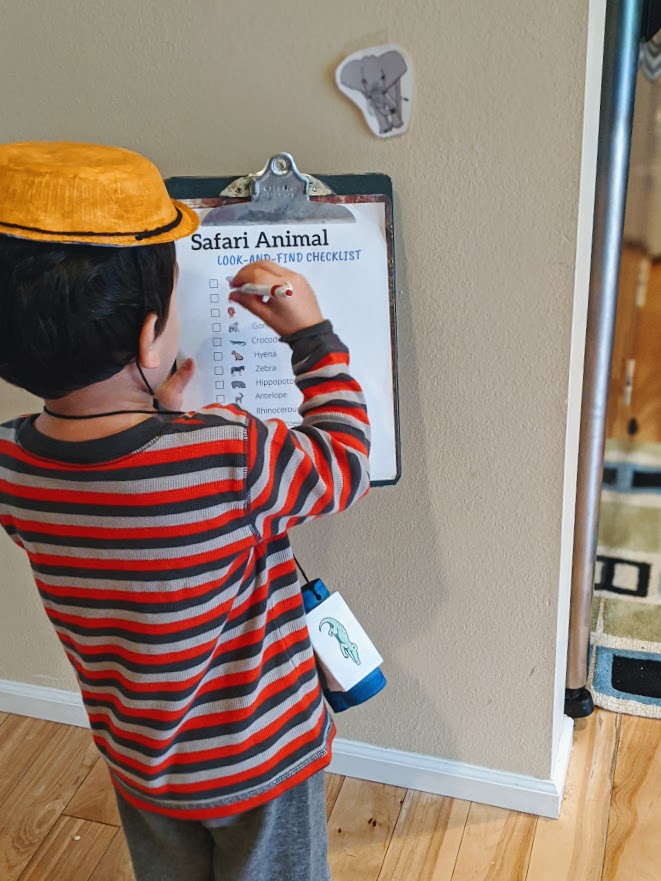 Child playing the safari animal game