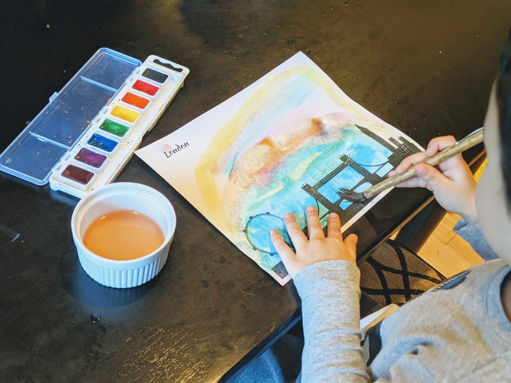 Preschooler painting his London city skyline printable