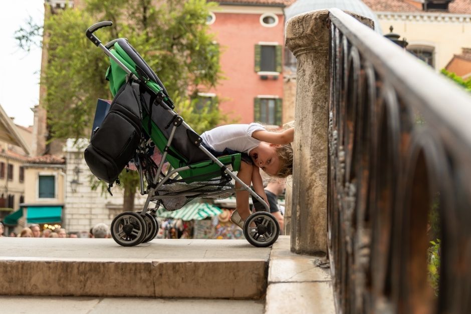 Child in a stroller in Venice Italy