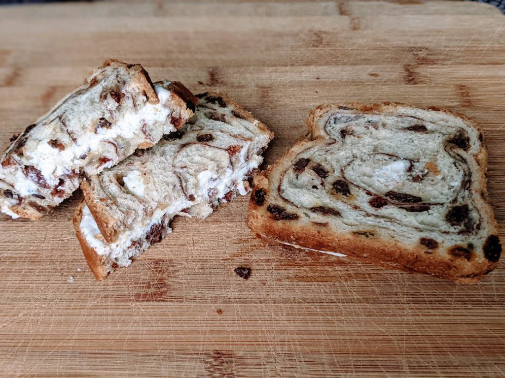 Cream cheese and raisin bread sandwiches- a perfect road trip food