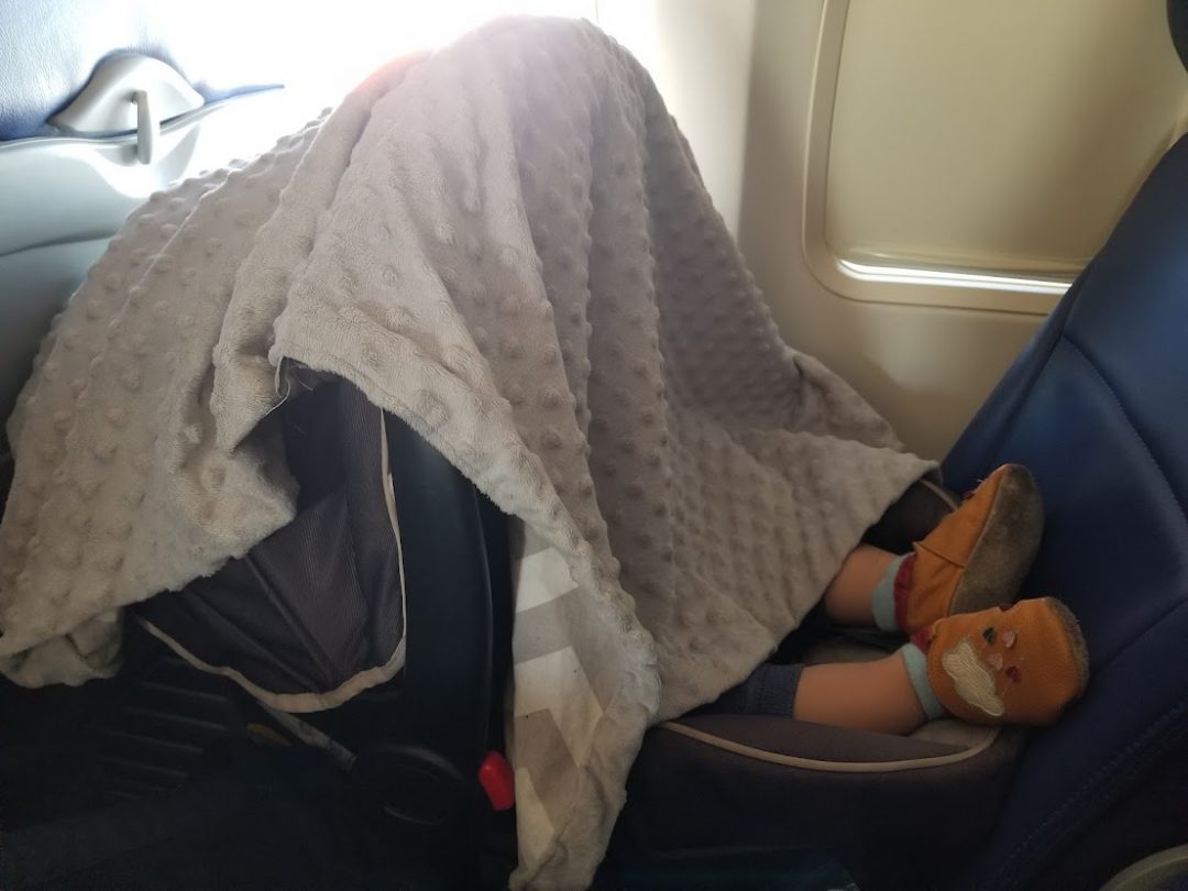 How to Get a Toddler to Sleep on the Plane (Tips that work!) Go