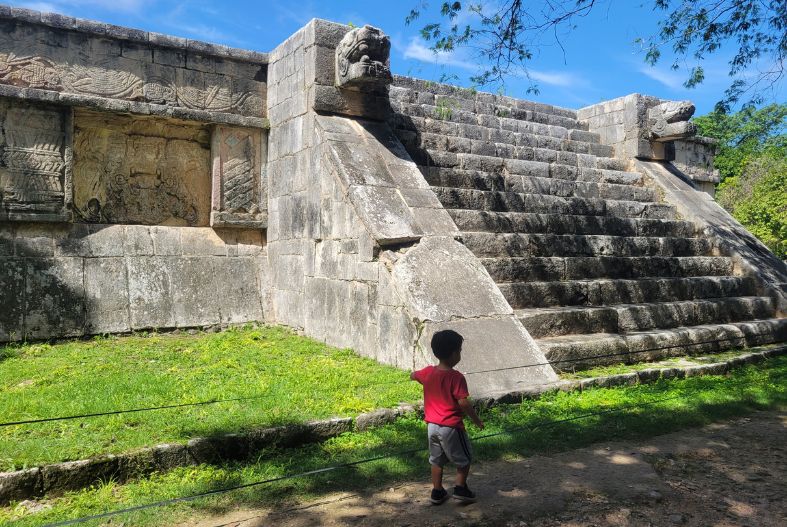 Child walking around Chichen Itza