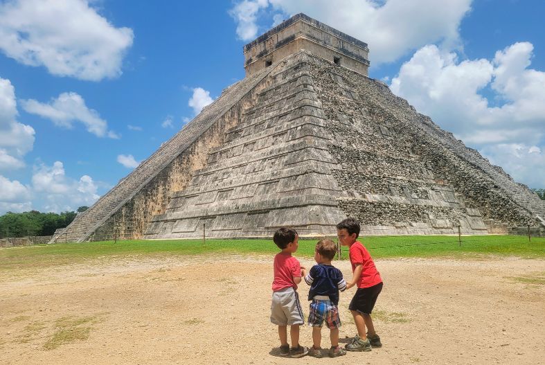 Kids in front of the pyramid at Chichen Itza