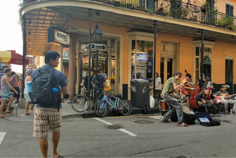 Man wearing a diaper bag in New Orleans