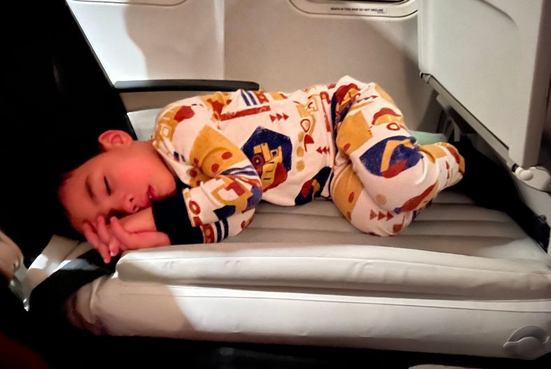 Child sleeping on a Flyaway Kids Bed