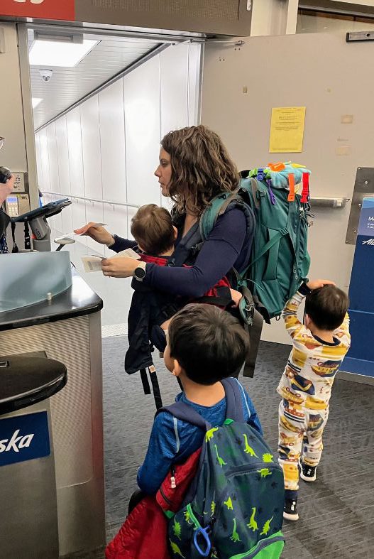 Baby in carrier at airport