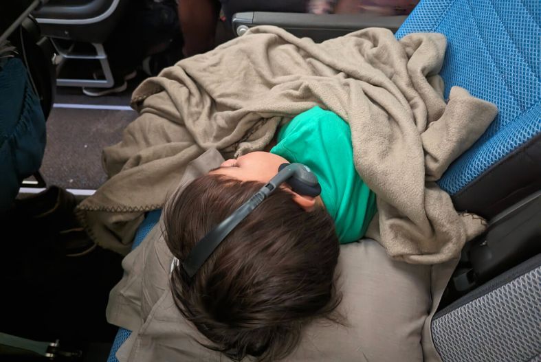 Child sleeping on the plane