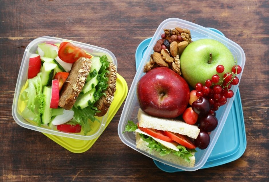 An assortment of lunch food packed in two containers