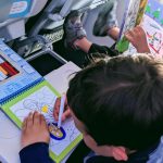 Kids drawing on a plane
