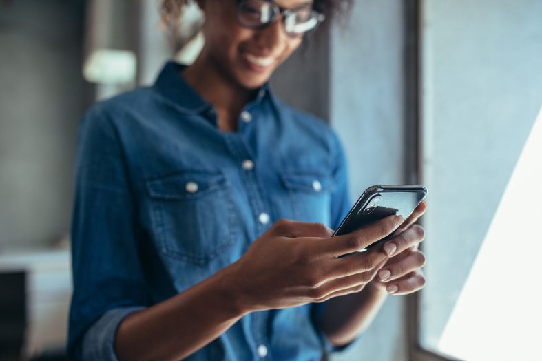 Woman looking at her cell phone